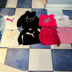 8 piece athletic shirts. Puma and Nike